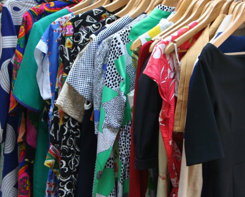 association-BAIROLS-min_dresses_apparel_clothing_clothes_clothes_hangers_wooden_hangers_retail_shop_closet-1149845